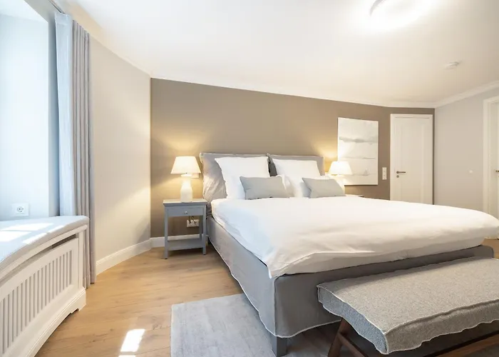 Semesterbostad Wattgefluester 4 *